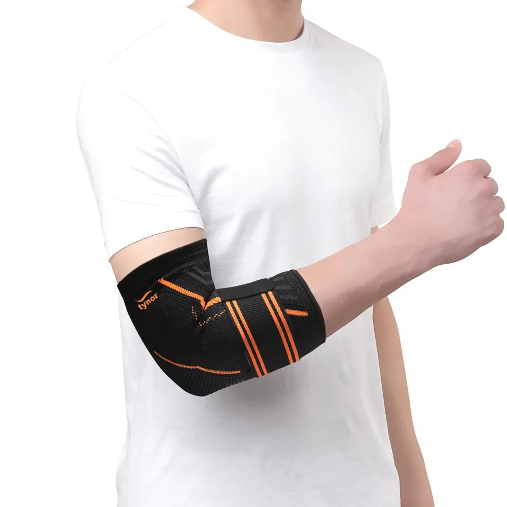 Air Pro elbow support in neon orange for compression, joint stability, and pain relief