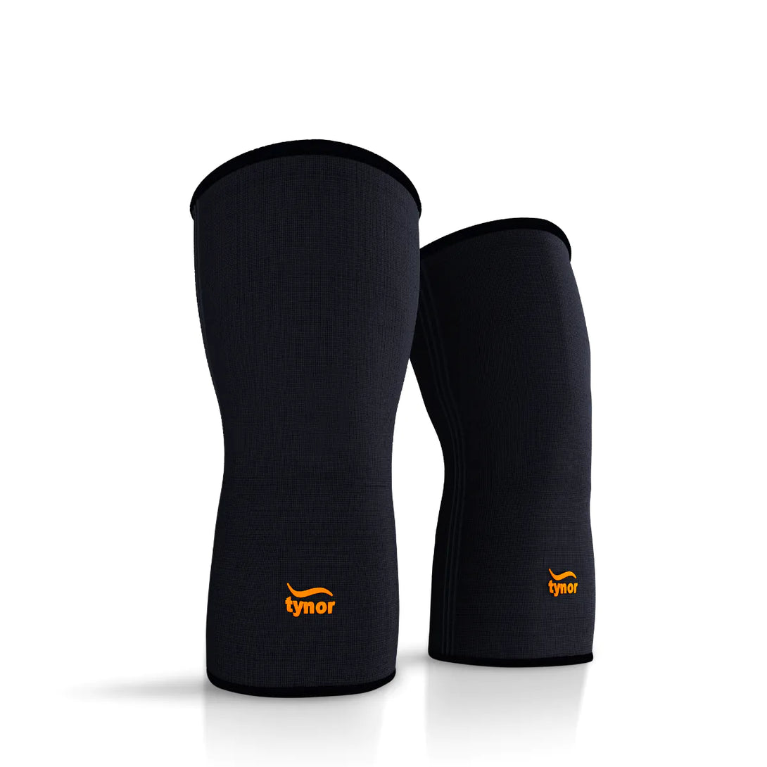 Neon orange Air knee cap providing breathable joint support and pain relief for active knees