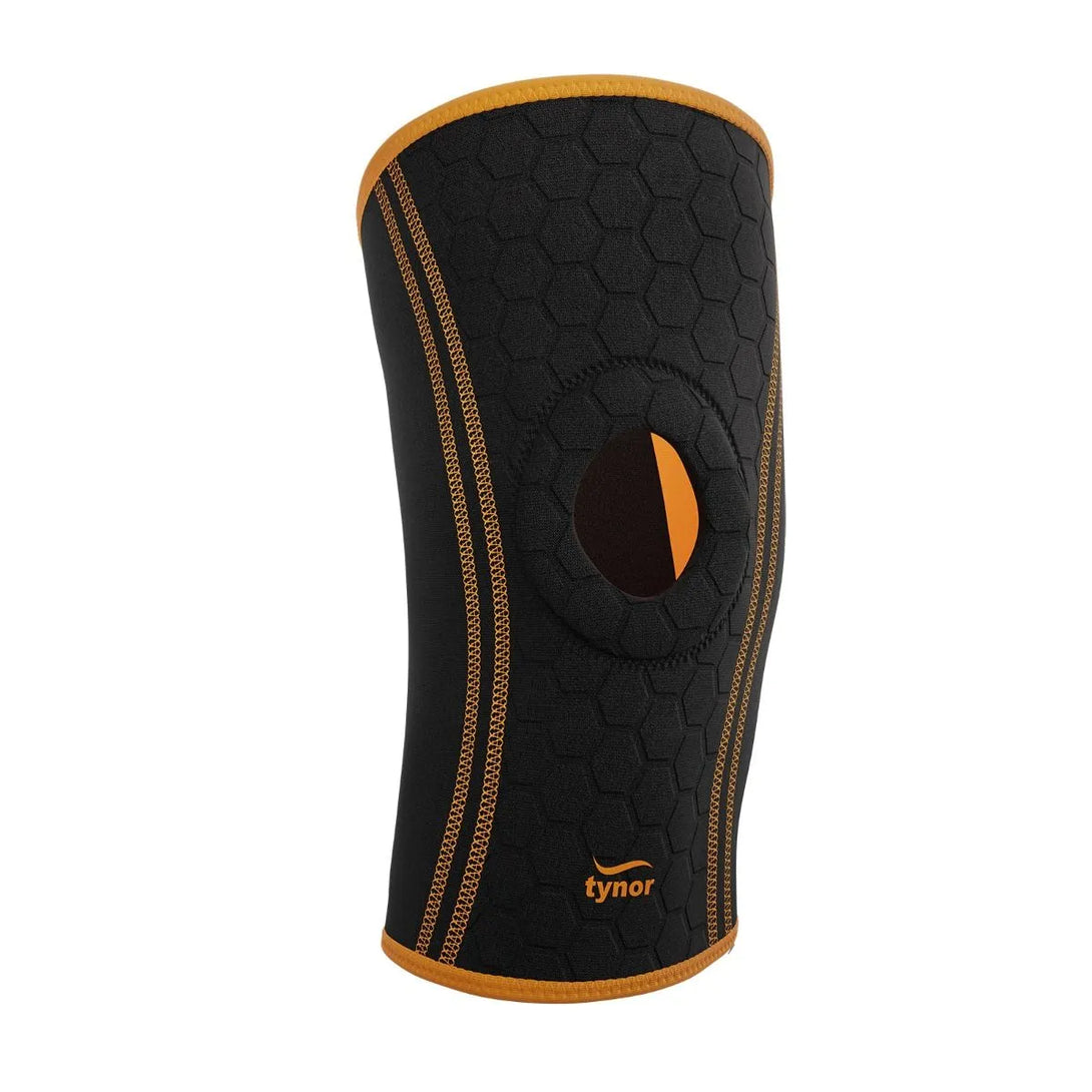 Neo knee cap in neon orange for compression, joint support, and pain relief during movement