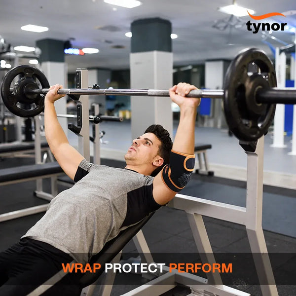 Tynor Elbow Wrap Neo 304 worn during a bench press
