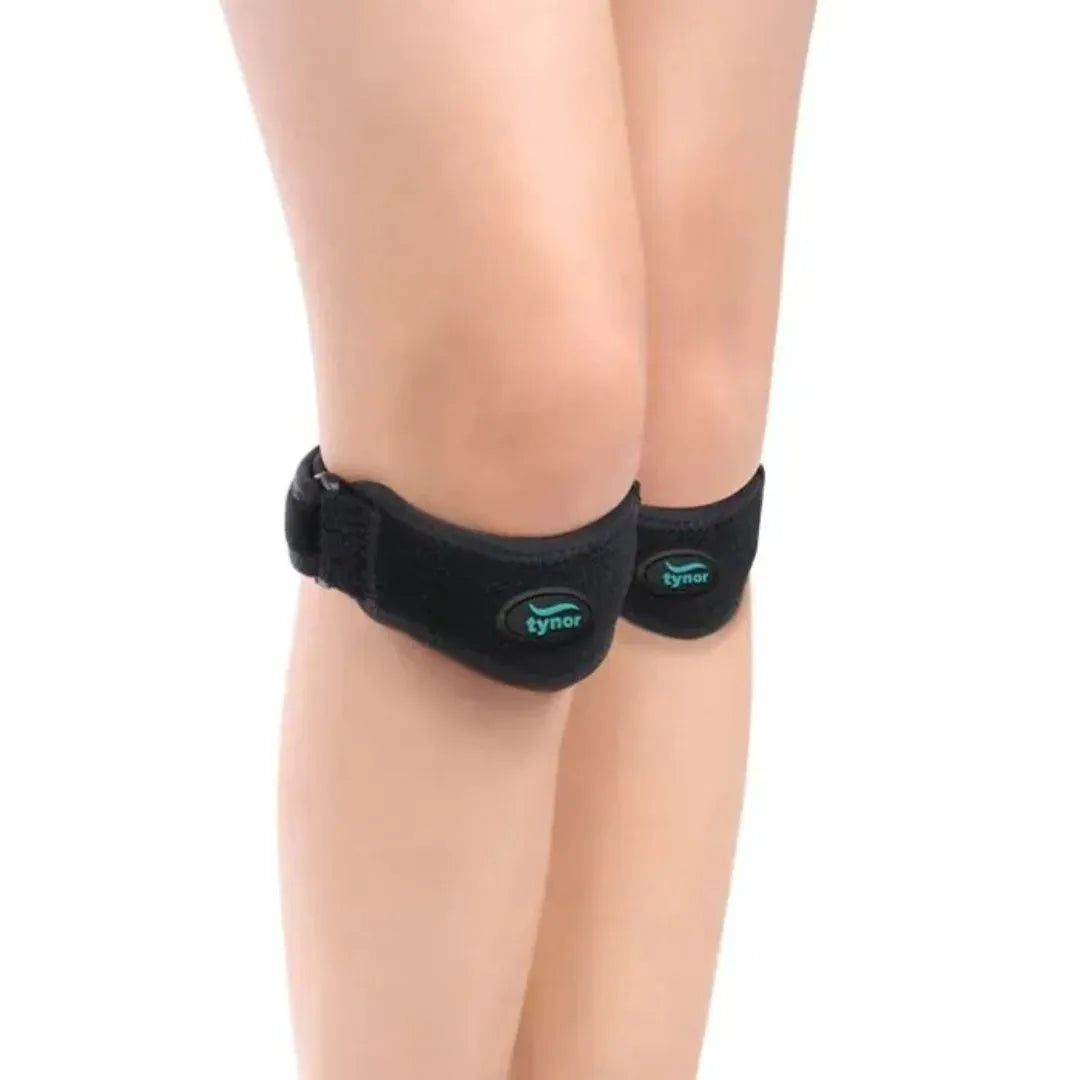 Black knee brace on a person's knee