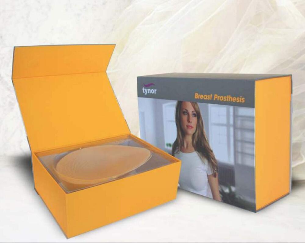 Tynor breast prosthesis packaging with a woman&#39;s image on a white background