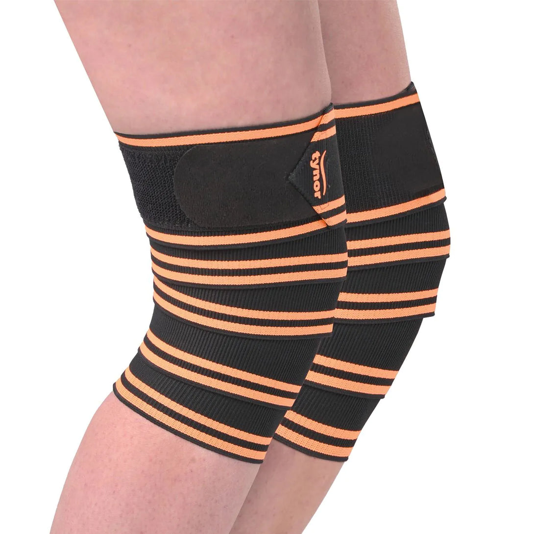 Neon orange weight lifting knee wrap for joint support, compression, and injury prevention