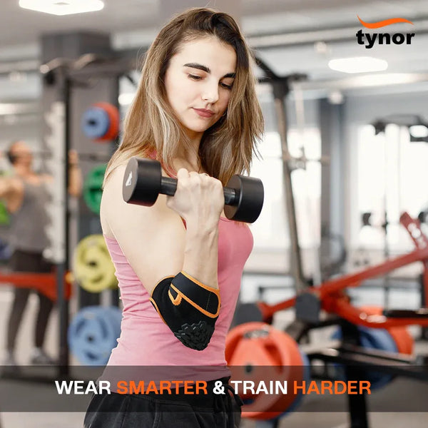 Tynor Elbow Wrap Neo 304 worn during a bicep curl